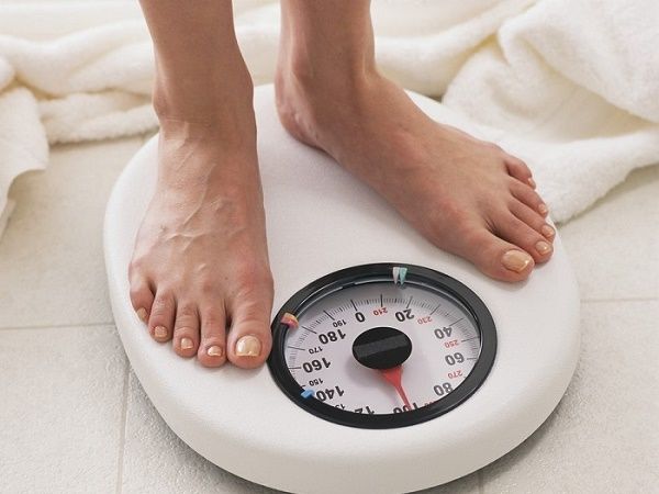 Mộng thấy người khác đang dùng cái cân